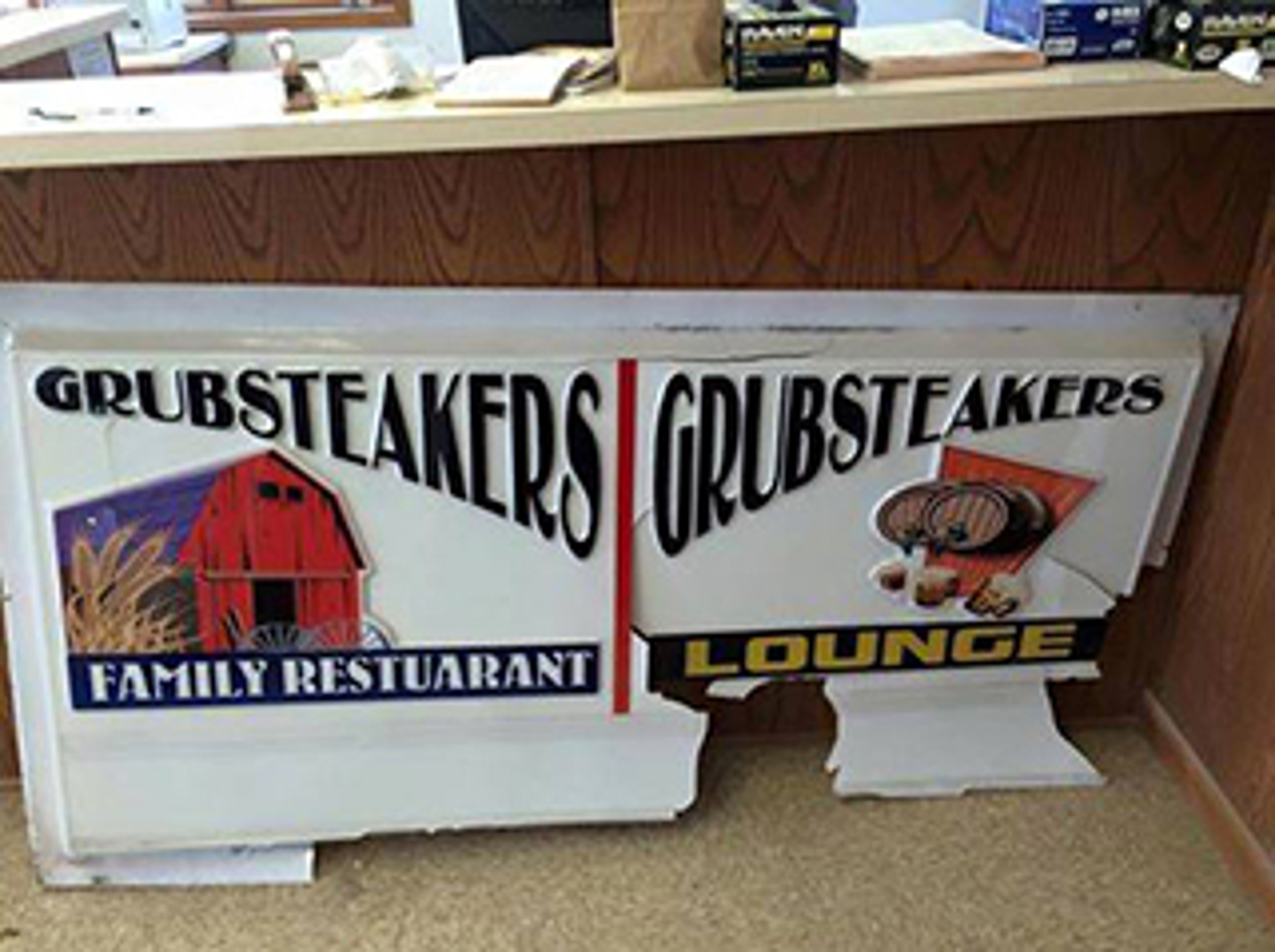 The sign for Grubsteakers Family Restaurant was found in a farmer's field in Harvard, Illinois roughly 49 miles away.