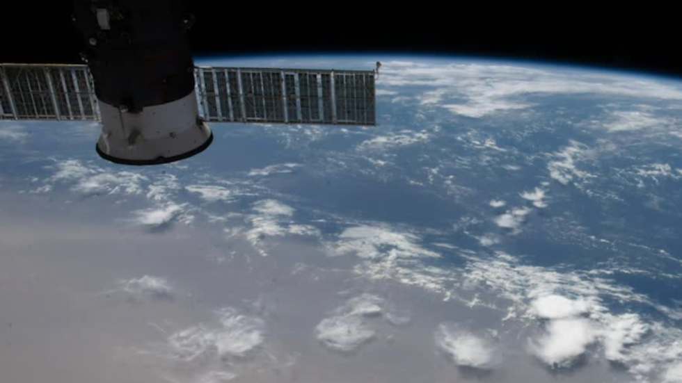 ISS Soars Over Solar Eclipse and Saharan Dust on Summer Solstice ISS Soars Over Solar Eclipse and Saharan Dust on Summer Solstice