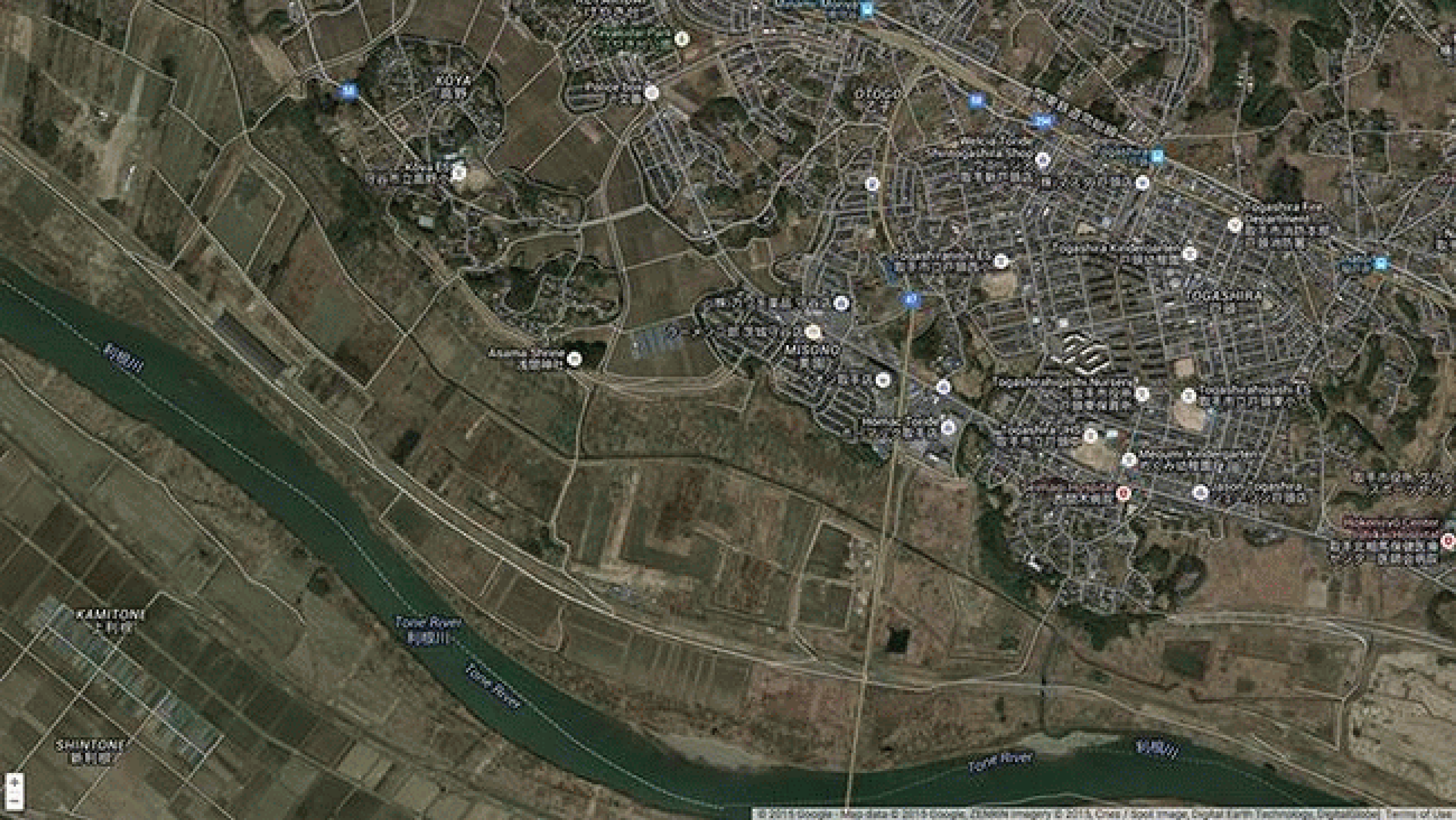 The swollen Tone River swamps fields in the floodplain southeast of Moriya, Japan on September 11, 2015.