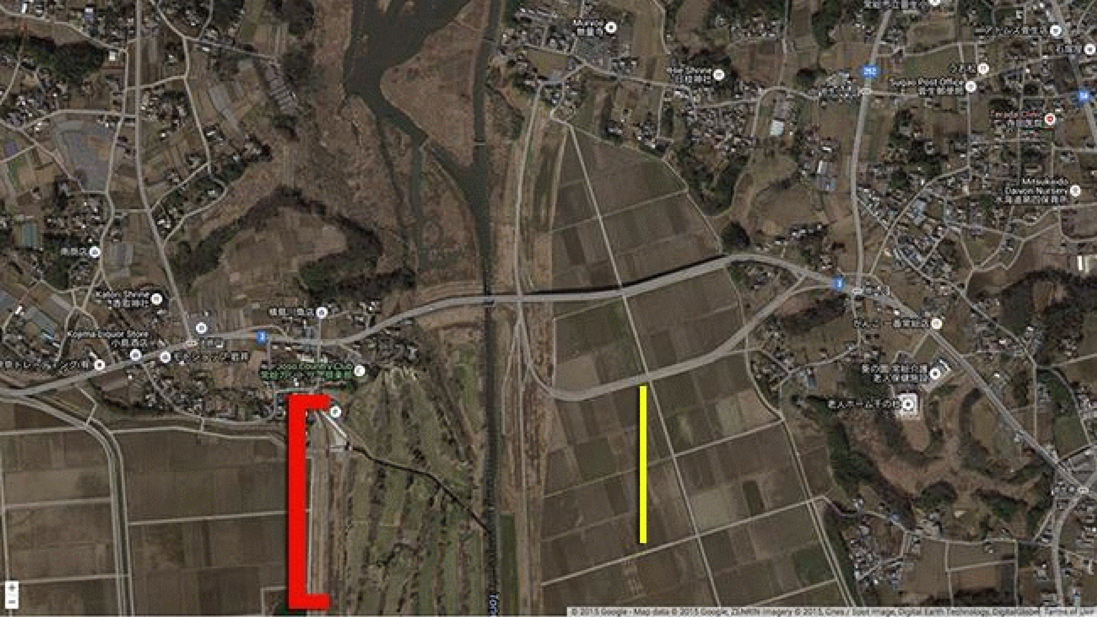 A tributary of the Tone River floods the Joso Country Club (indicated to the right of the red bracket) and spilled into a floodplain west of Moriya, Japan on September 11, 2015. An inundated bridge is highlighted at the top of the yellow line.