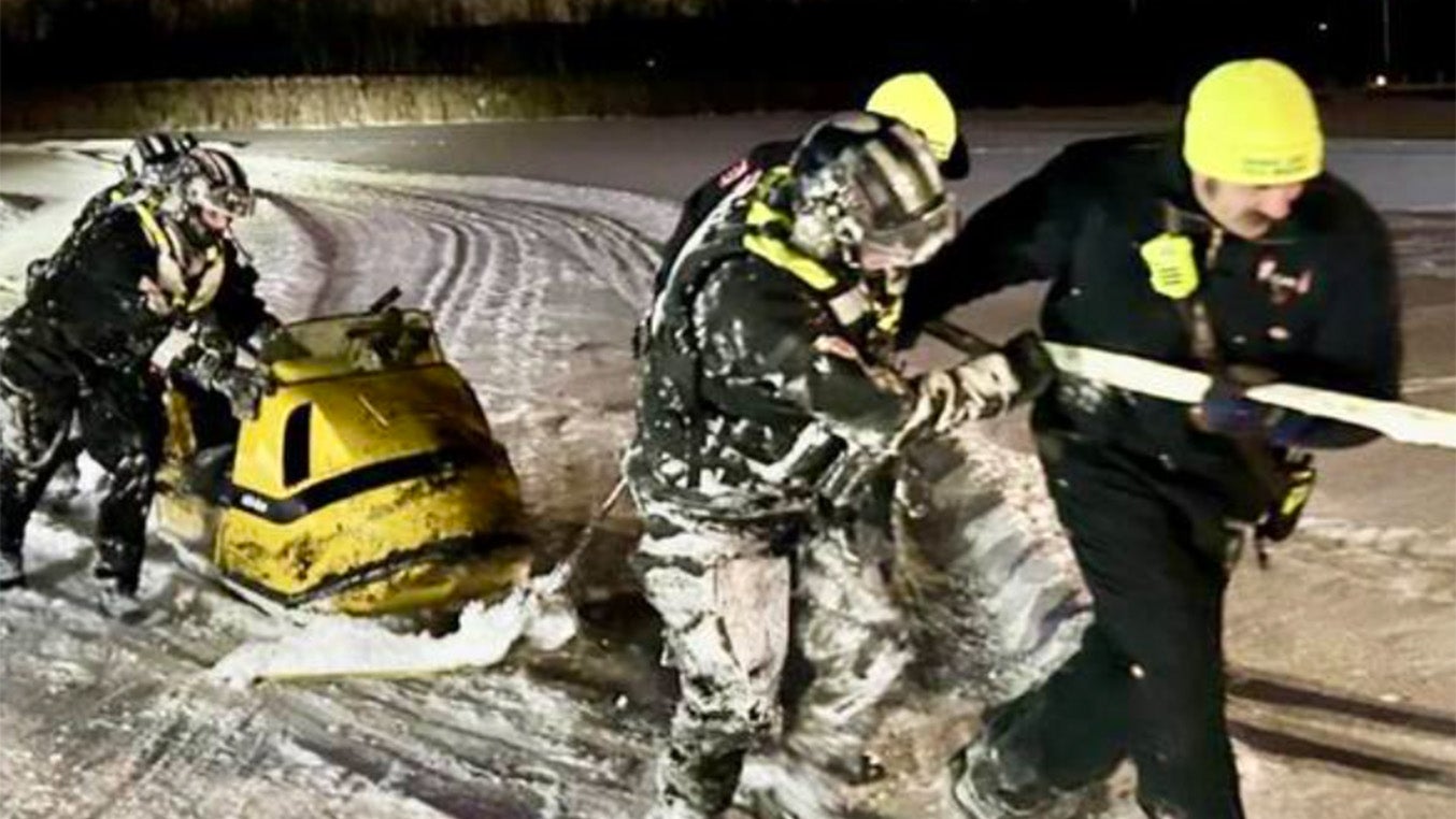 Ice Safety Alert: Snowmobile Operator Pulled From Frozen Lake After Ice Breakthrough