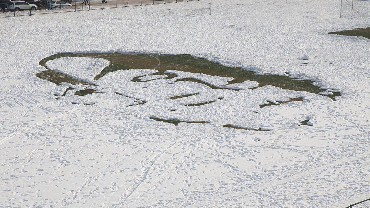 Students in China Draw Famous Face Using Snow