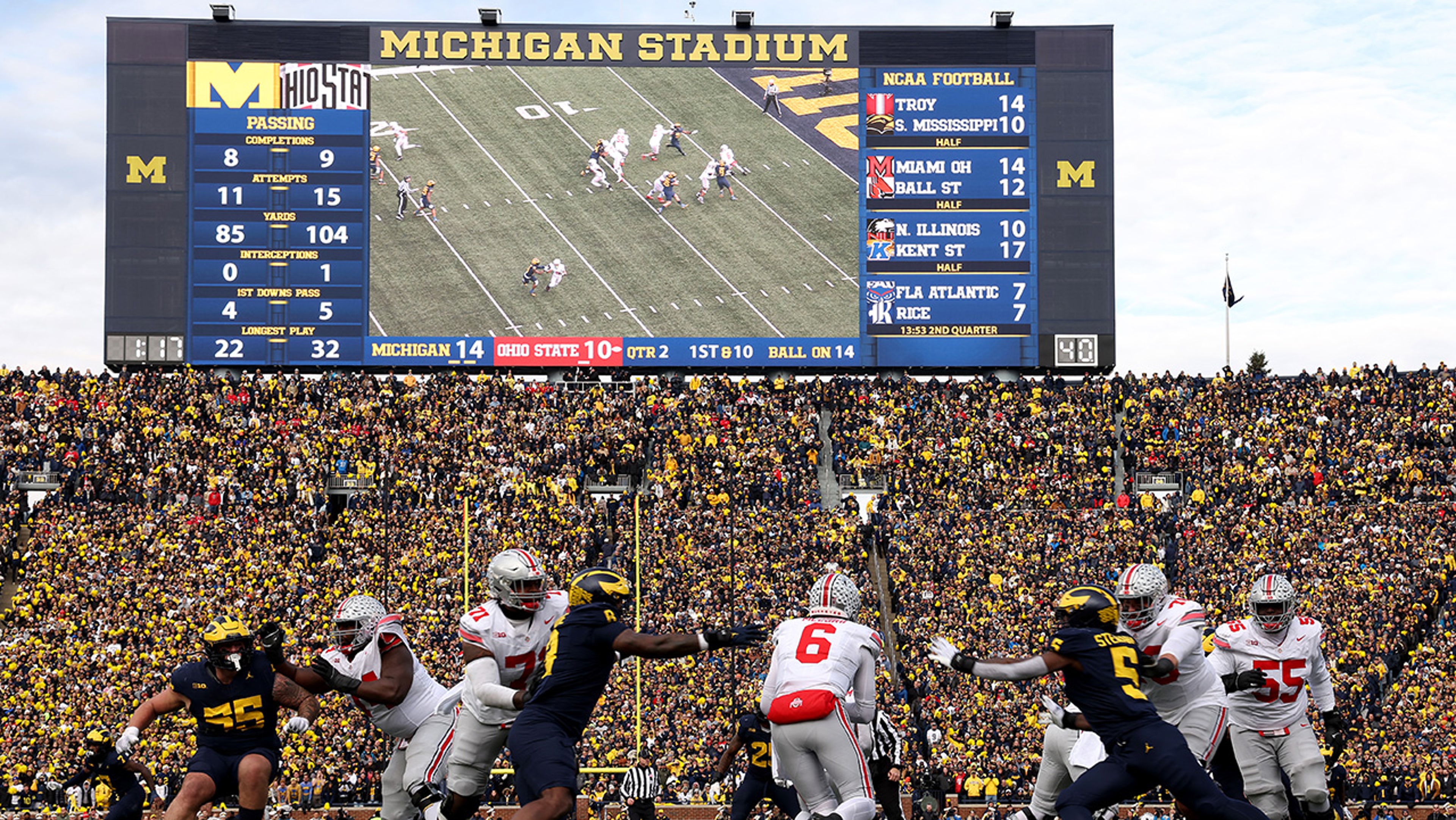 Ohio State Buckeyes taking on the Michigan Wolverines in 2023 in Ann Arbor, Michigan. Also referred to as "The Game," it is considered one of the biggest rivalries in college football.
