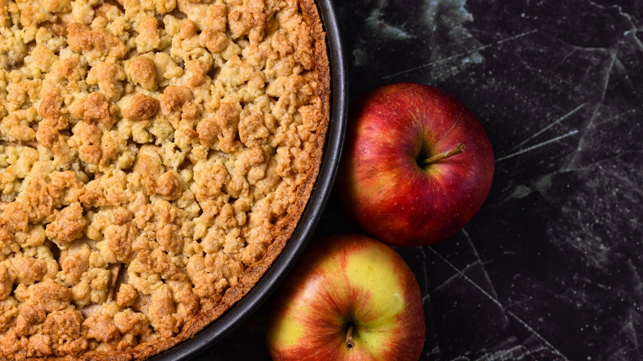 crumbly sour cream apple pie on table
