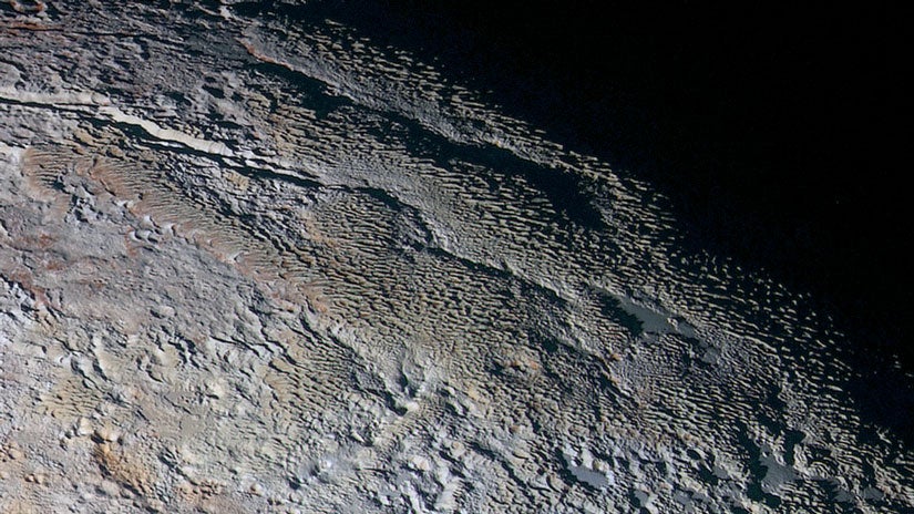 Brand-New Images of Pluto Show 'Dragon Scales' on Dwarf Planet