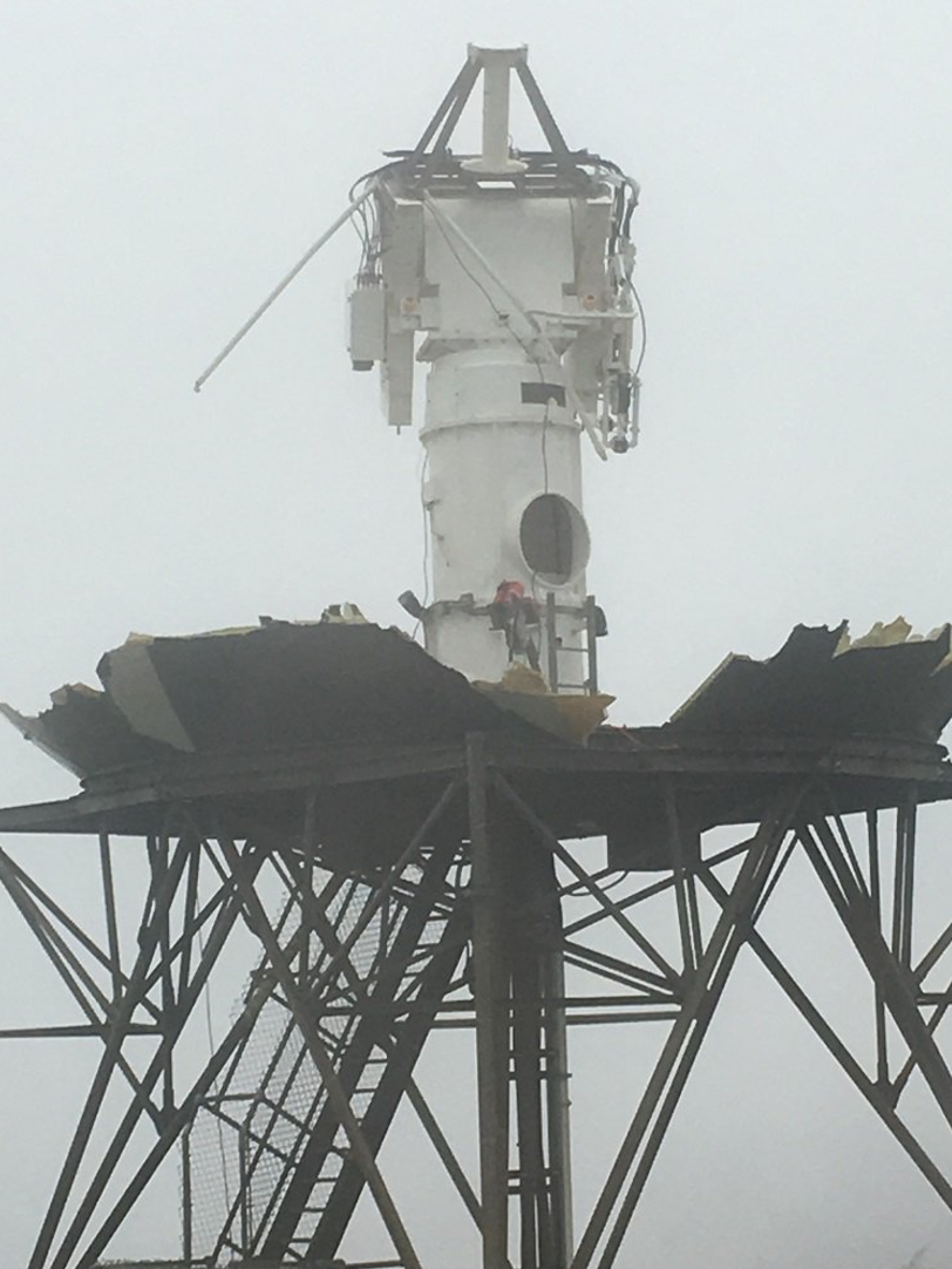 Close detail shows that both the dome that conceals the radar and the radar dish are gone. 