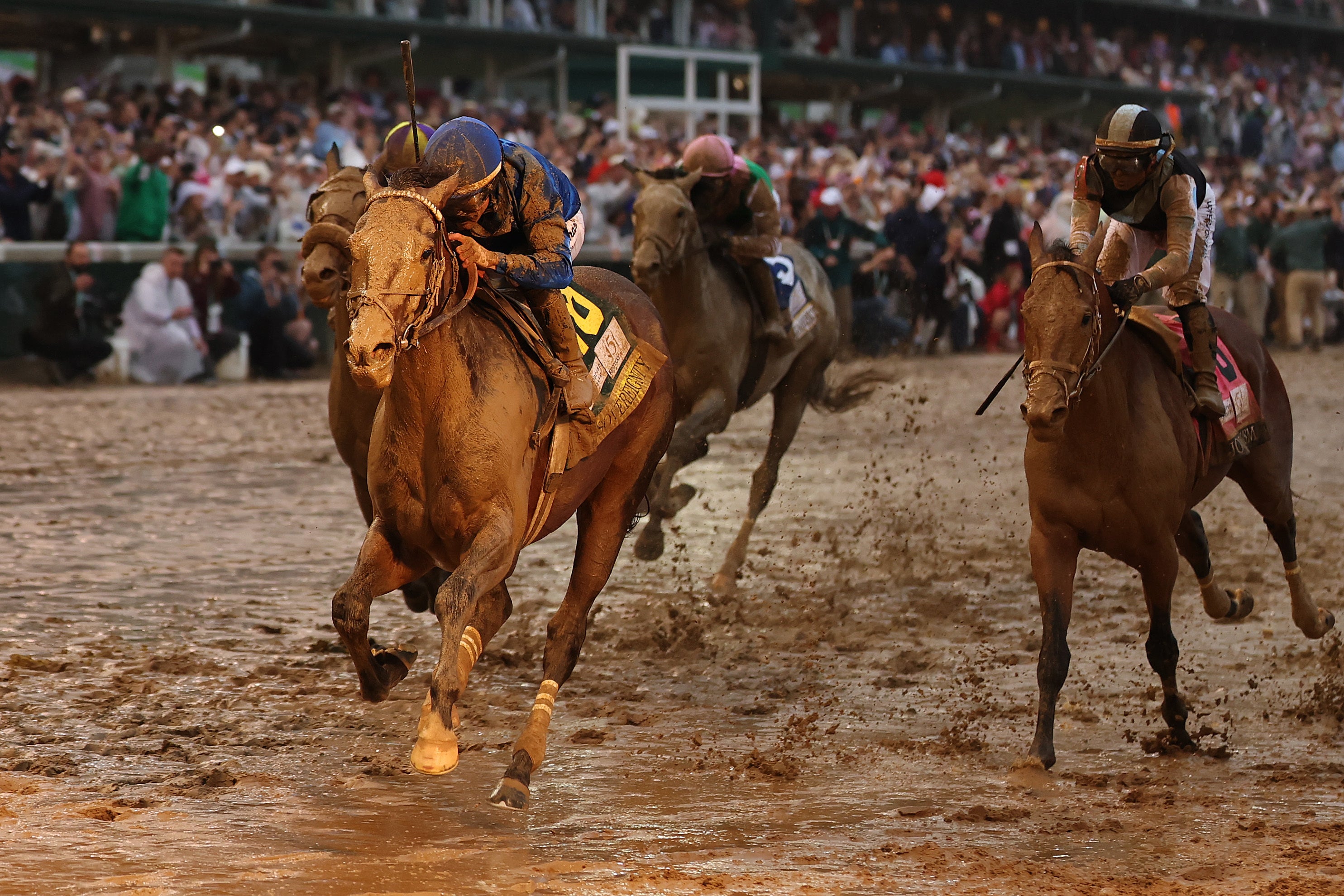 LOUISVILLE, KENTUCKY - MAY 03: Jockey Junior Alvarado, atop Sovereignty #18, crosses the finish line to win the 151st running of the Kentucky Derby at Churchill Downs on May 03, 2025 in Louisville, Kentucky. (Photo by Michael Reaves/Getty Images)