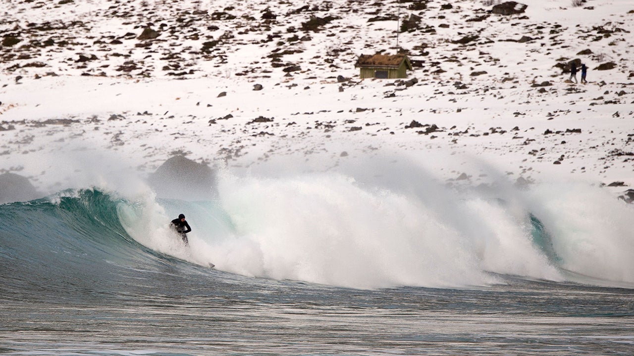 Surfers Brave the Norwegian Cold for High Swells (PHOTOS)