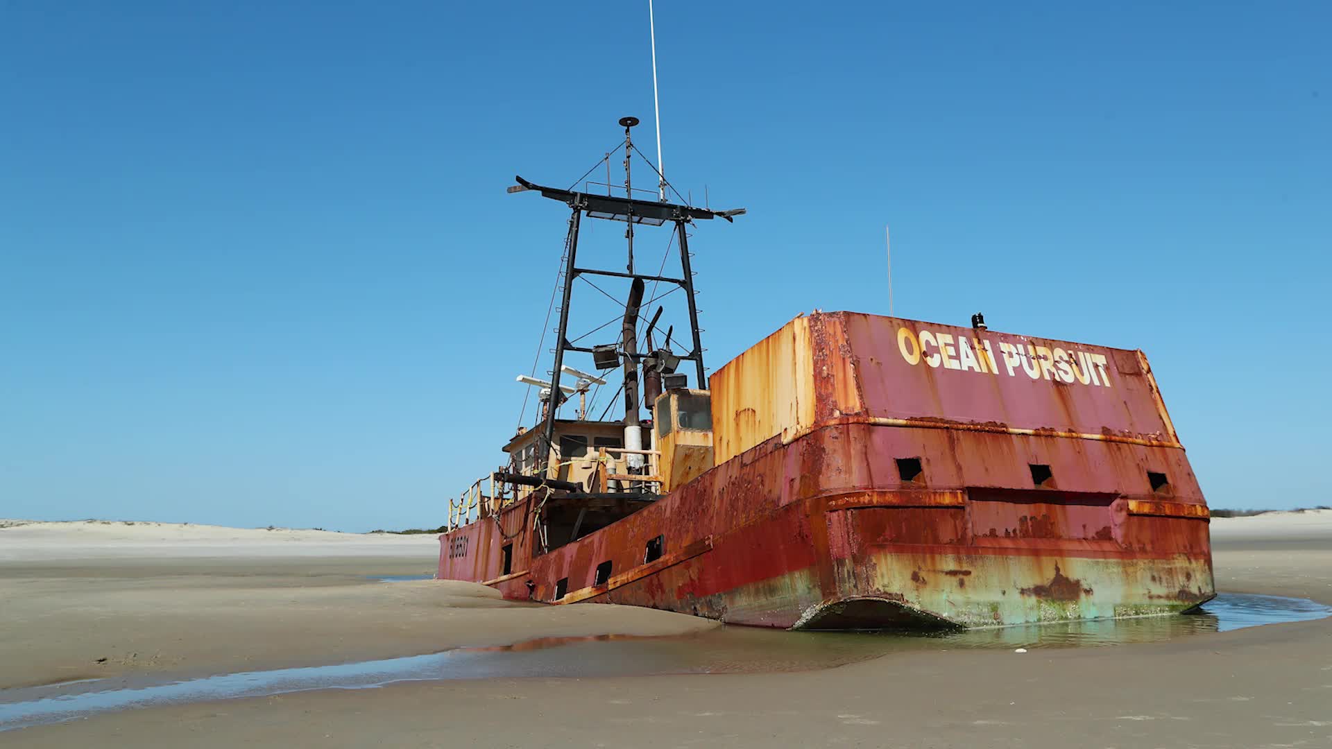 Shipwreck Sinking Into Beach at North Carolina’s Outer Banks  The