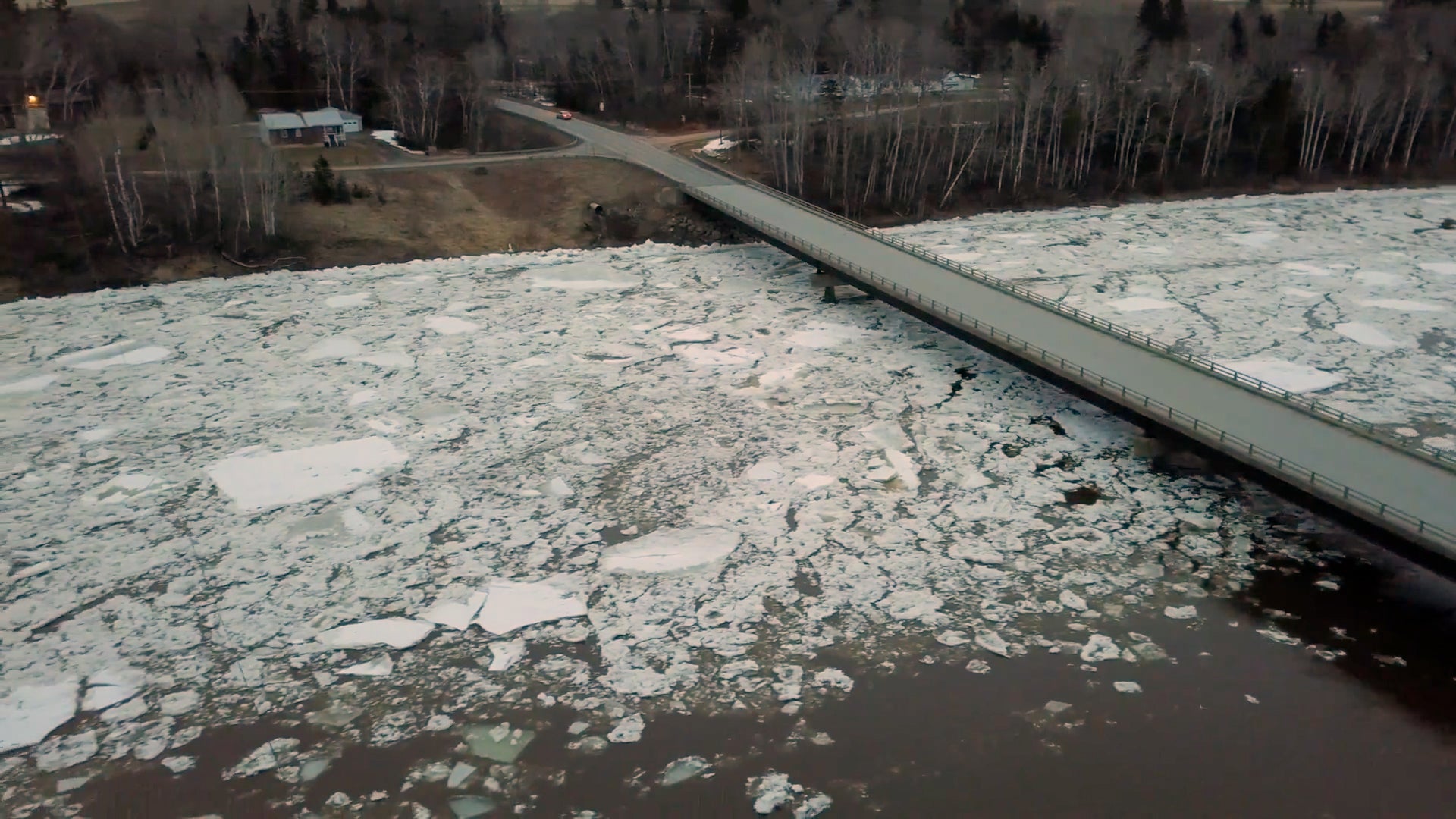 Ice is seen traveling down the Aroostook River in Washburn, Maine, after a 5-mile-long ice jam broke apart earlier than expected as rising temperatures moved into the area. (Meteorologist James Sinko via Storyful)