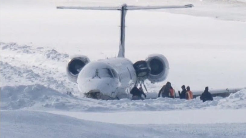 Passenger airplane missed track during landing in snow