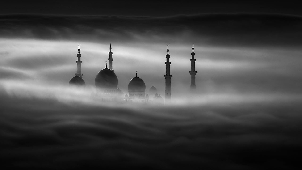 Abu Dhabi's Sheikh Zayed Grand Mosque, the largest mosque in the United Arab Emirates, is photographed through the fog. (Khalid Alhammadi/Caters)                                                                                                                                                                                                                                                                                                                                                                                                                                                                                                                                  