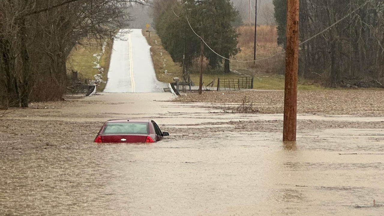 A car is surrounded by floodwaters in Warren County, Kentucky, on Saturday, Feb. 15, 2025. (Warren County Sheriff's Office via Facebook)
