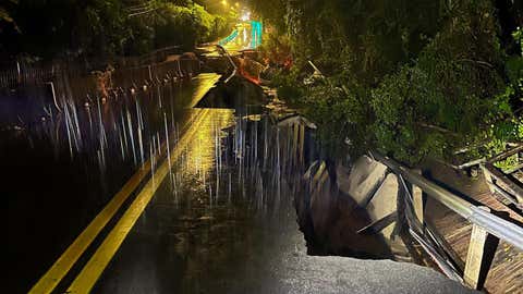 Flash floods washed out part of a road in Mount Dora, Florida on Sunday, October 26, 2025.