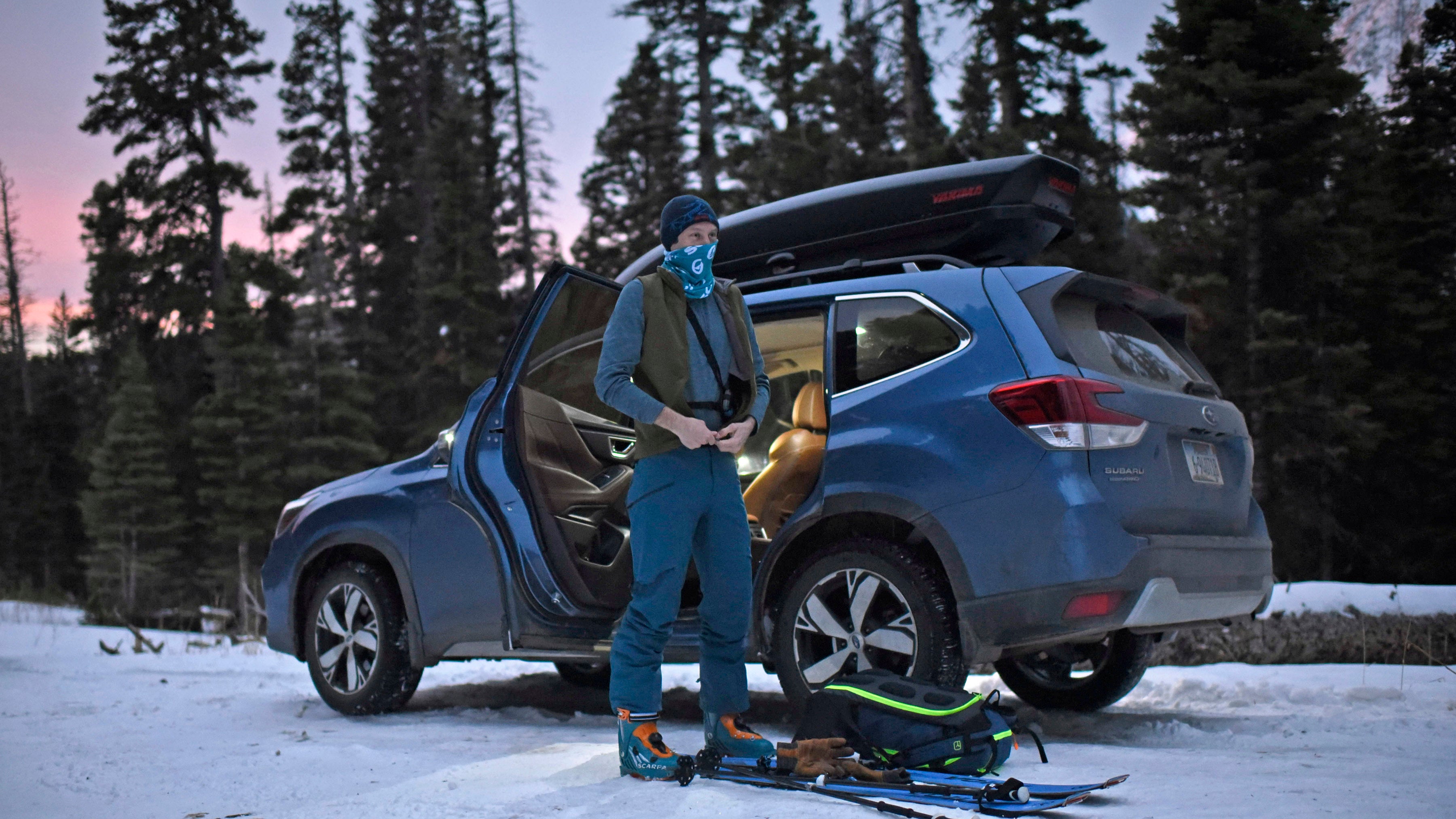 Ben Werner, author of "The Bozeman and Big Sky Backcountry Ski Guide," prepares his gear to go backcountry skiing at dawn on Nov. 25, 2020, near Fairy Lake and Bozeman, Mont. Officials and experienced backcountry skiers are worried new restrictions at Montana ski areas could drive more inexperienced people into the backcountry this winter, increasing the risk of avalanche deaths. (Rachel Leathe/Bozeman Daily Chronicle via AP)