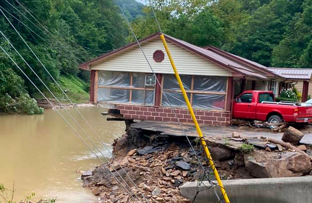 This photo provided by Bristol Virginia Professional FireFighters Association shows damage from severe weather on Monday, Aug. 30, 2021 in Hurley, Va. About 20 homes were moved from their foundations and several trailers washed away amid flooding in western Virginia from the remnants of Hurricane Ida, local officials said. (Bristol Virginia Professional FireFighters Association via AP)