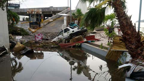A street is strewn with debris after Hurricane Otis ripped through Acapulco, Mexico, Wednesday, Oct. 25, 2023. (AP Photo/Marco Ugarte)