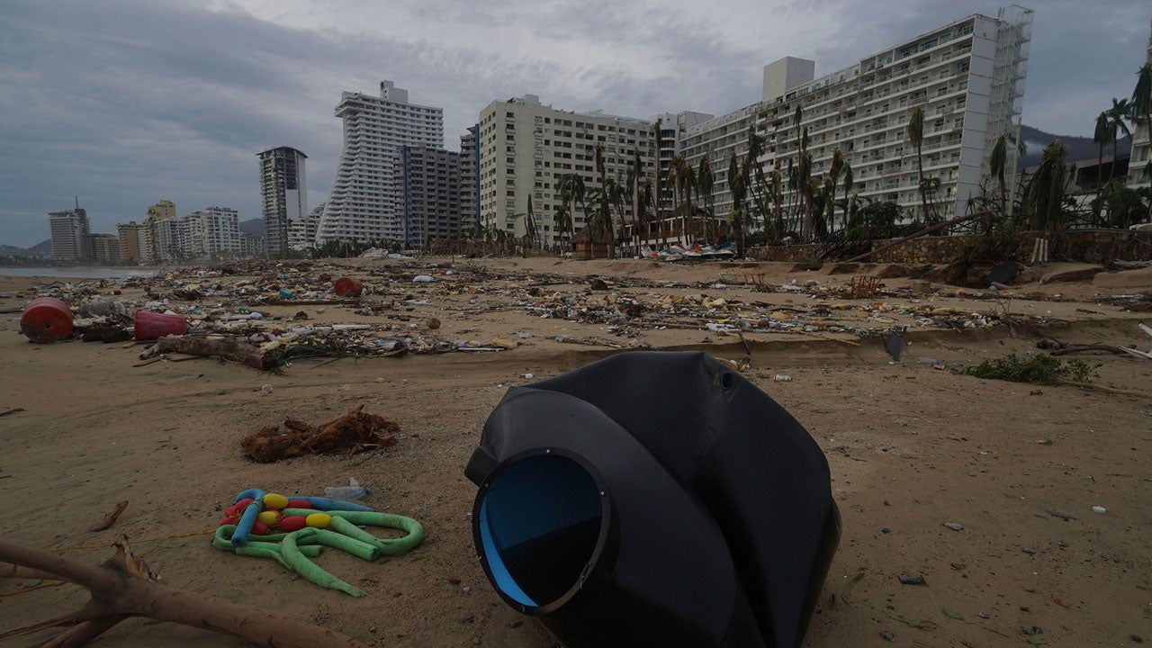 Debris lies on the beach after Hurricane Otis ripped through Acapulco, Mexico, Wednesday, Oct. 25, 2023. (AP Photo/Marco Ugarte)