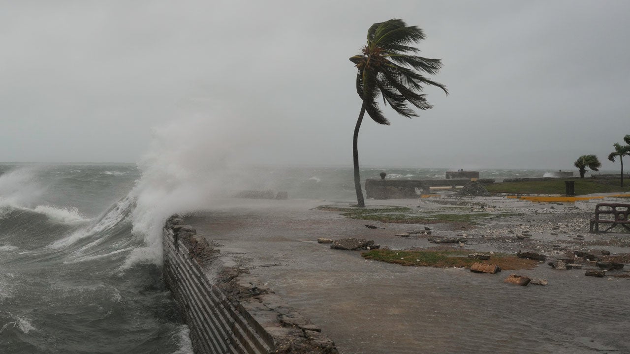 Waves splash in Kingston, Jamaica, as Hurricane Melissa approaches, Tuesday, Oct. 28, 2025. (AP Photo/Matias Delacroix)