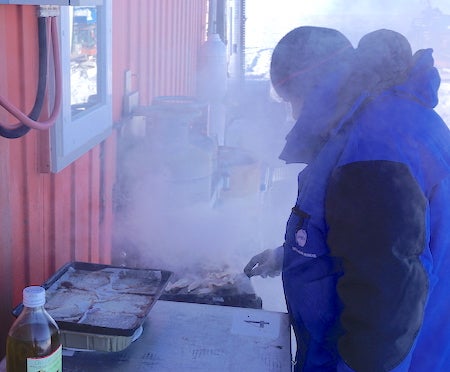 Grilling food at the Paleo site in Antarctica