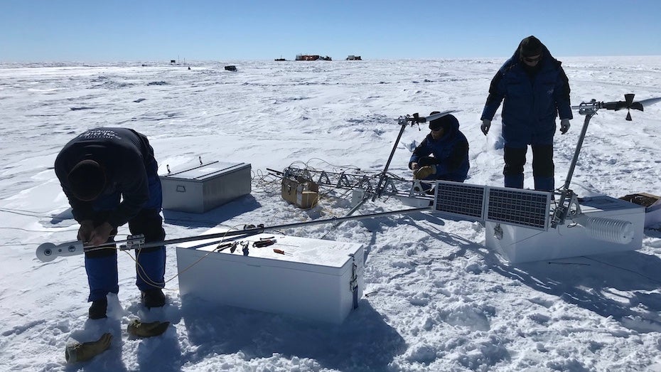 EAIIST members assemble a weather station near the Paleo runway