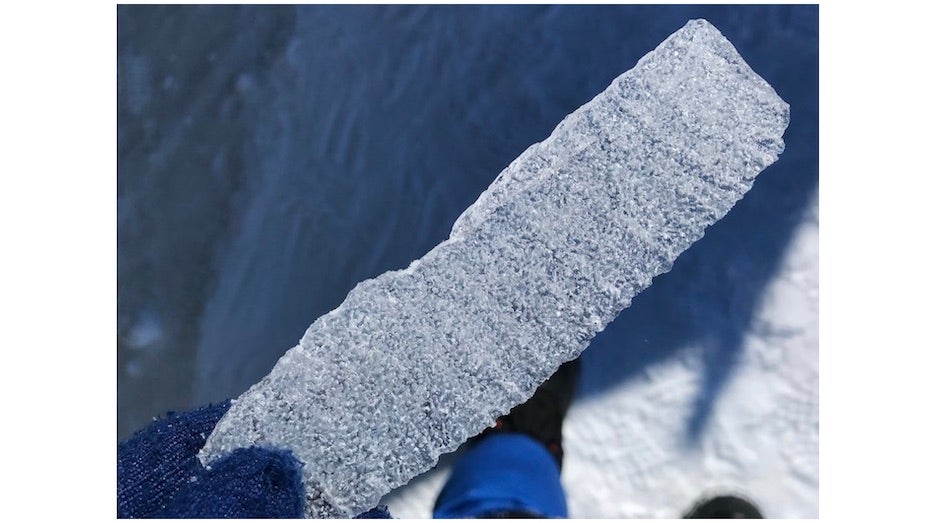 A piece of ice that fractured off the ice core drilled around 300 ft (100 m) below the surface