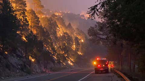 The Bighorn Fire burning in the hills north of Tucson, Arizona, has consumed more than 48 square miles. Evacuations were ordered in several communities. (Chris Ader/Three Points Fire District)