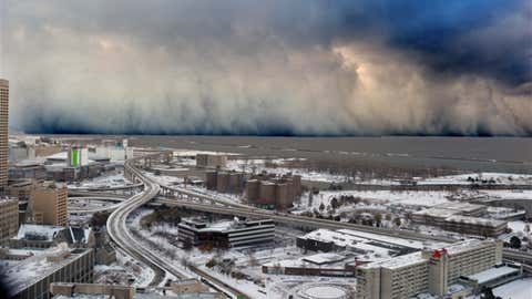 A wall of intense snowfall descends on the Buffalo Southtowns during a historic back-to-back lake-effect snow event in November 2014. (Shawn Smith/NOAA Weather in Focus Photo Contest 2015)
