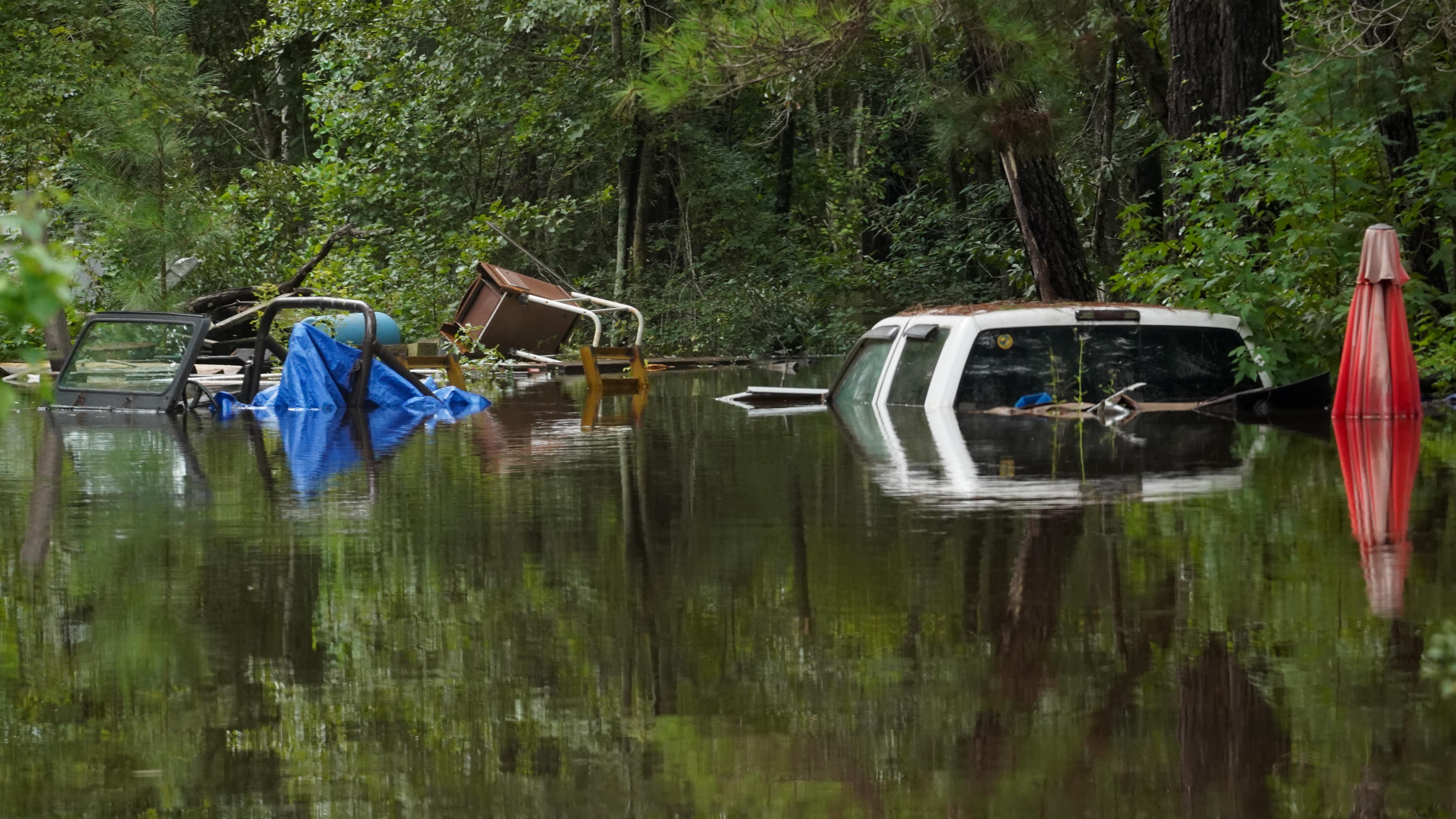 Trucks are submerged after excessive rains caused flooding on August 7, 2024 in Statesboro, Georgia. (Photo by Megan Varner/Getty Images)