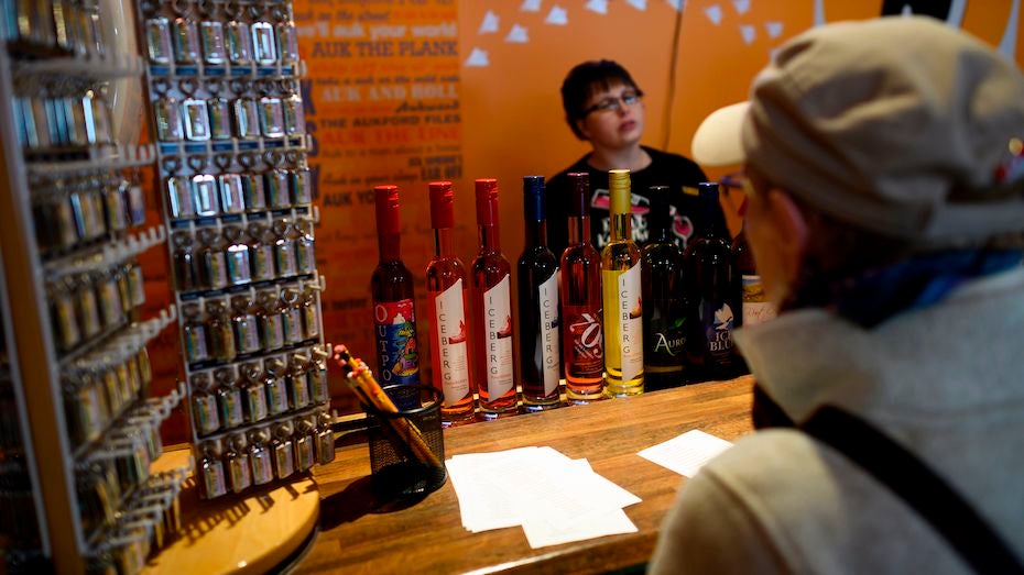 Tourist looks at iceberg wine in Newfoundland, 7/2/19