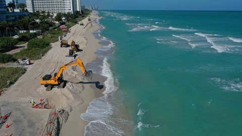 MIAMI BEACH, FLORIDA - JANUARY 14: An aerial view from a drone shows as construction work by the U.S. Army Corps of Engineers distributes sand along the beach on January 14, 2020 in Miami Beach, Florida. The project is part of a $16 million dollar project funded by the federal government to use a total of 61,000 tons of sand to widen the beaches in an effort to fight erosion and protect properties from storm surges. (Photo by Joe Raedle/Getty Images)