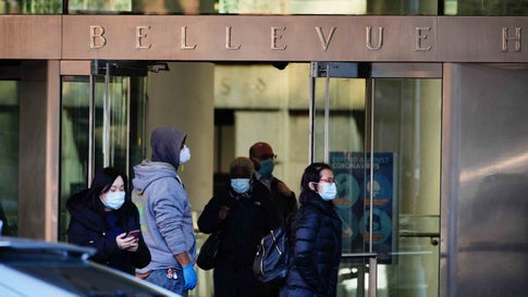 A view of people wearing masks in Bellevue Hospital amid the coronavirus (COVID-19) outbreak on March 24, 2020 in New York City (Photo by John Nacion/NurPhoto via Getty Images)