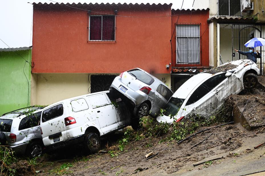 Cars damaged and swept during floods related by Tropical Storm Cristobal are pictured in Panchimalco, El Salvador, on 6/3/20