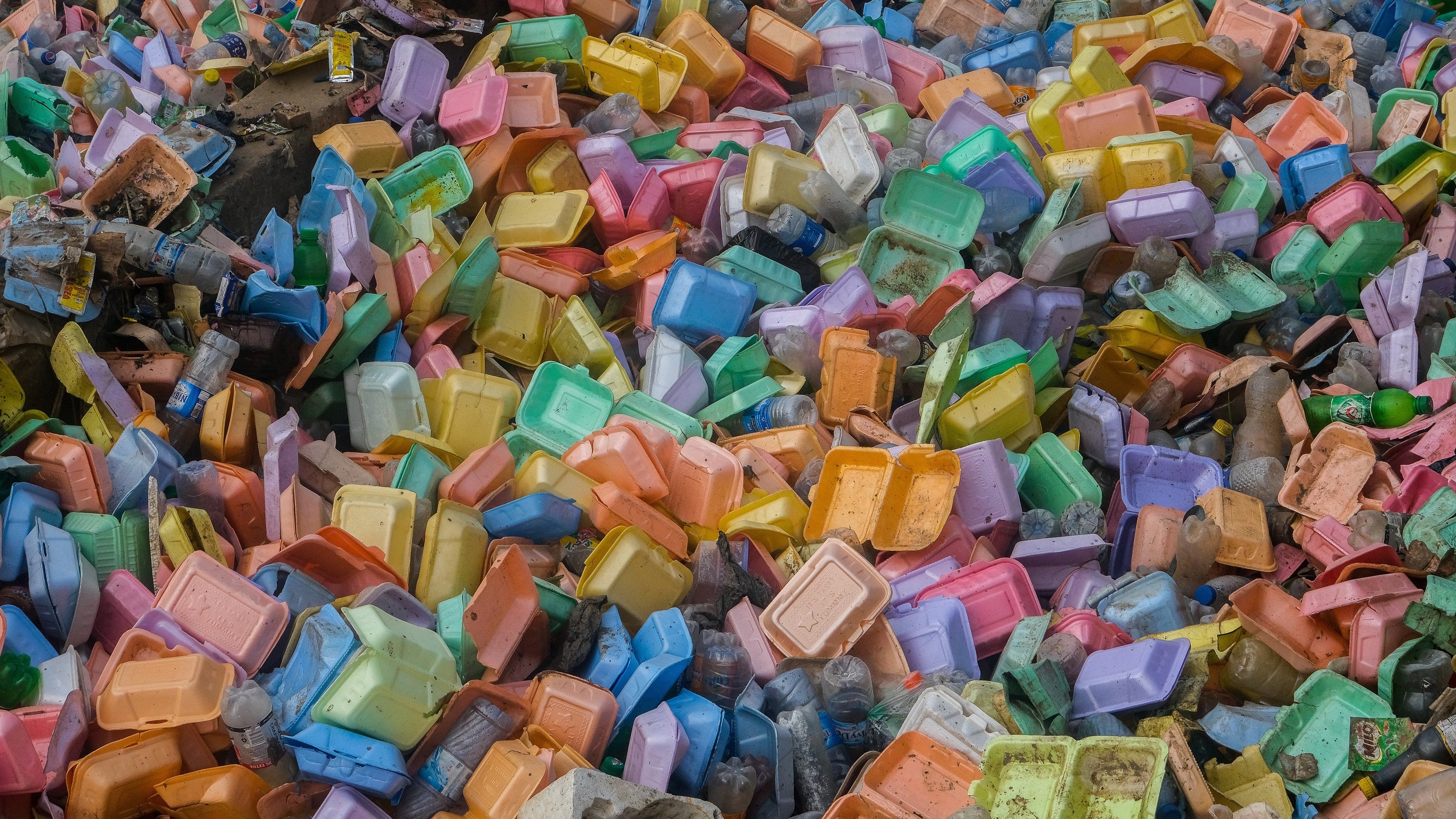Garbage piles cover fields after heavy rainfall in Lagos, Nigeria on June 7, 2020. (Adeyinka Yusuf/Anadolu Agency via Getty Images)