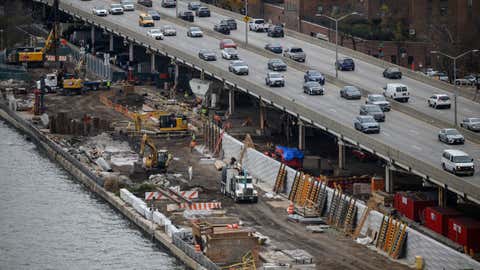 A general view shows contruction work on a flood defense project on the east side of Manhattan, New York city, on December 12, 2021. - After major storms highlighted New York's weaknesses in the face of climate change, the city is erecting a $1.45-billion system of walls and floodgates to protect it from rising sea levels.
Superstorm Sandy in 2012 was the trigger for establishing the East Coast Resiliency Project (ESCR), running 2.5 miles (four kilometers) along the shoreline of Lower Manhattan. Hurricane Ida, which ravaged parts of the city this year, added further urgency. (Photo by Ed JONES / AFP) (Photo by ED JONES/AFP via Getty Images)