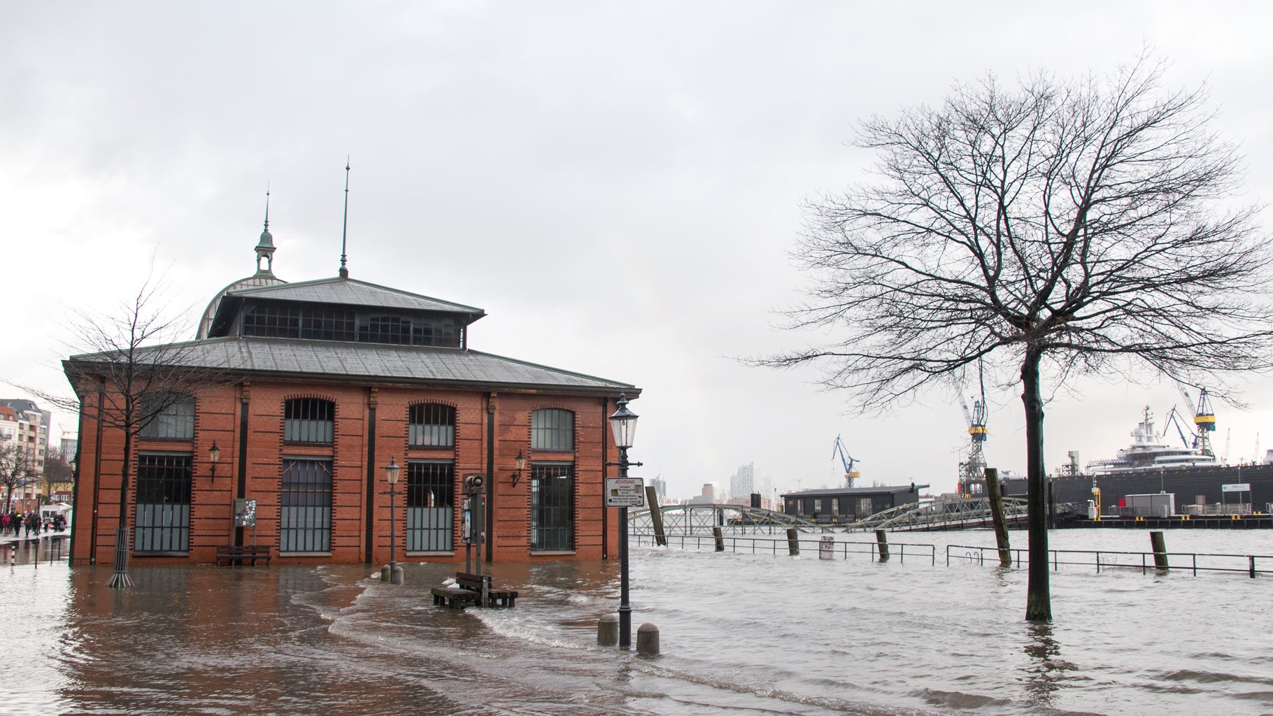 The fish market is flooded in Hamburg, Germany, on Thursday, Feb. 17, 2022, as Storm Dudley batters northern Europe. (Photo by Daniel Bockwoldt/picture alliance via Getty Images)