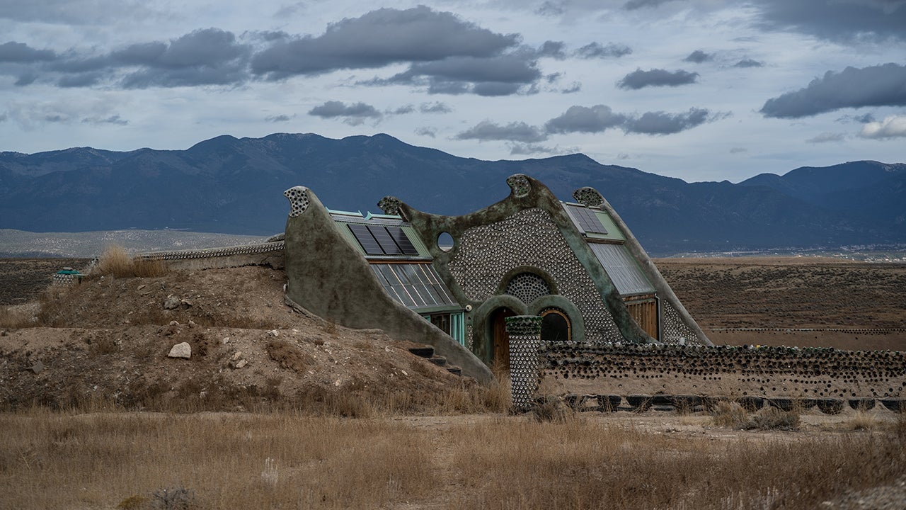 The exterior of an Earthship is pictured in Taos, New Mexico, on Dec. 8, 2021. (Ramsay de Give for The Washington Post via Getty Images)