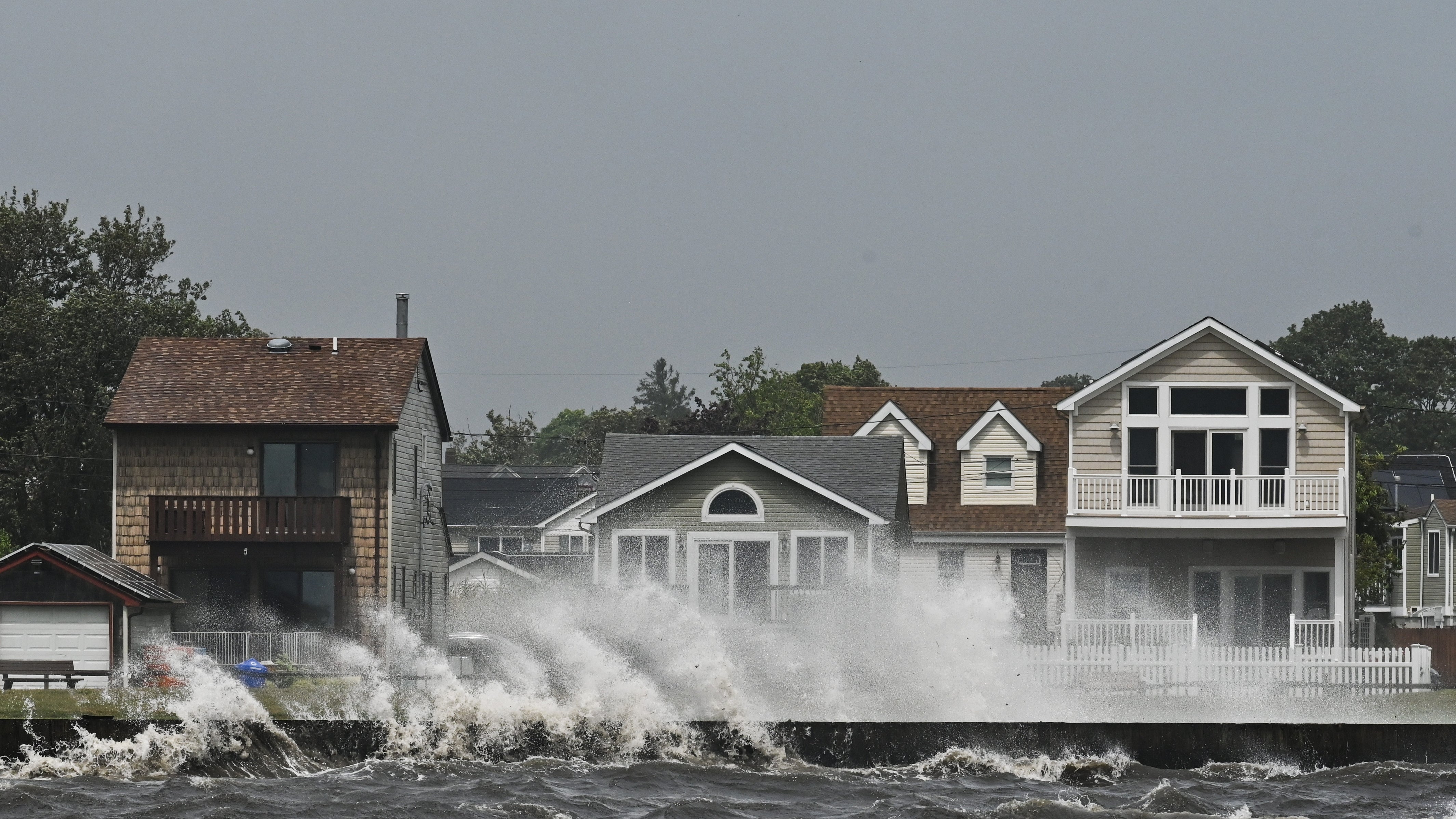 Patchogue, N.Y.: Waves crash along the shore of Patchogue, New York as tropical storm Isaias moves across Long Island on August 4, 2020. (Photo by Steve Pfost/Newsday RM via Getty Images)
