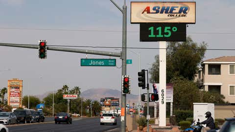 A digital sign displays a temperature of 115 degrees Fahrenheit as a heat wave continues to bake the Southwest United States on June 17, 2021, in Las Vegas, Nev. (Ethan Miller/Getty Images)