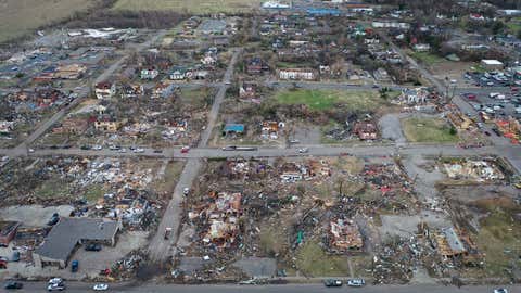 An aerial view of homes and business destroyed by a tornado on December 11, 2021 in Mayfield, Kentucky. Multiple tornadoes touched down in several midwestern states late Friday evening causing widespread destruction and leaving an estimated 70-plus people dead.   (Photo by Scott Olson/Getty Images)