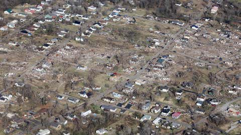 In this aerial view,homes and surrounding areas are heavily damaged after they were hit by a tornado three days prior,on Monday,Dec. 13,2021,in Dawson Springs,Kentucky. (Scott Olson/Getty Images)