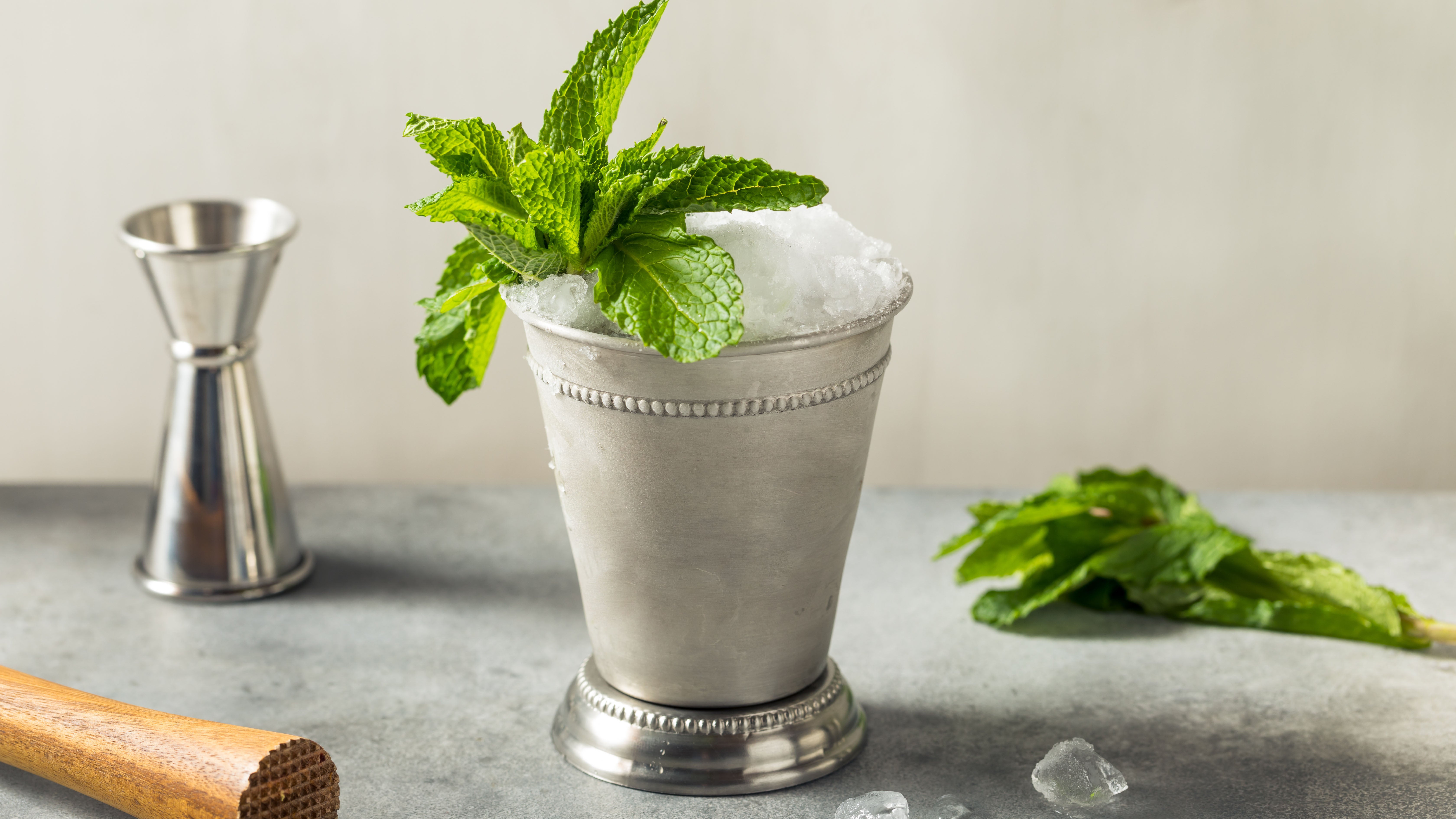 Making a large batch of mint syrup is an easy, delicious shortcut for making Mint Juleps for the Kentucky Derby.