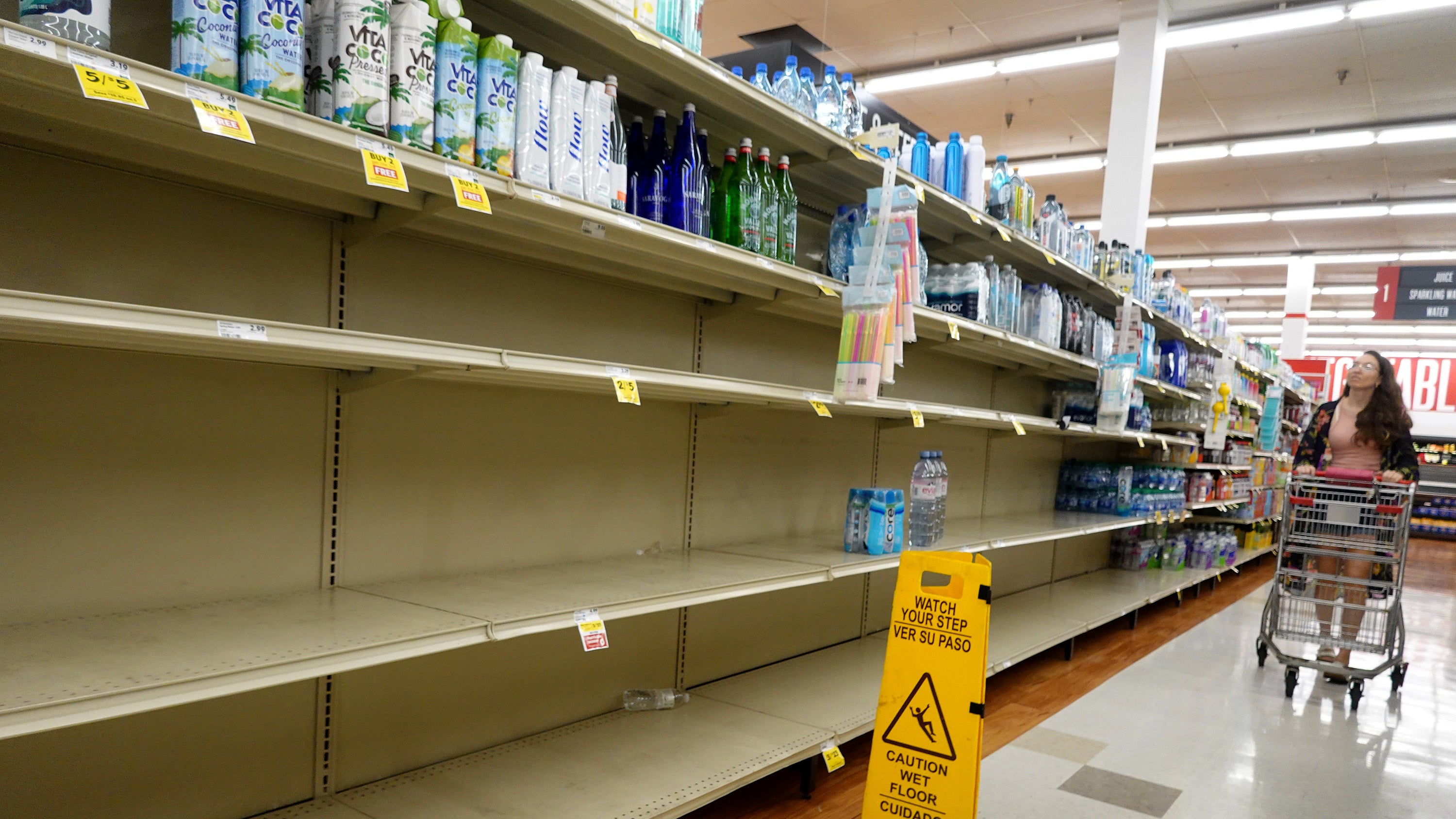 PINELLAS PARK, FLORIDA - AUGUST 29: A grocery store's water section is almost bare as people stock up ahead of the possible arrival of Hurricane Idalia on August 29, 2023 in Pinellas Park, Florida. Hurricane Idalia is forecast to make landfall on the Gulf Coast of Florida Wednesday morning. (Photo by Joe Raedle/Getty Images)