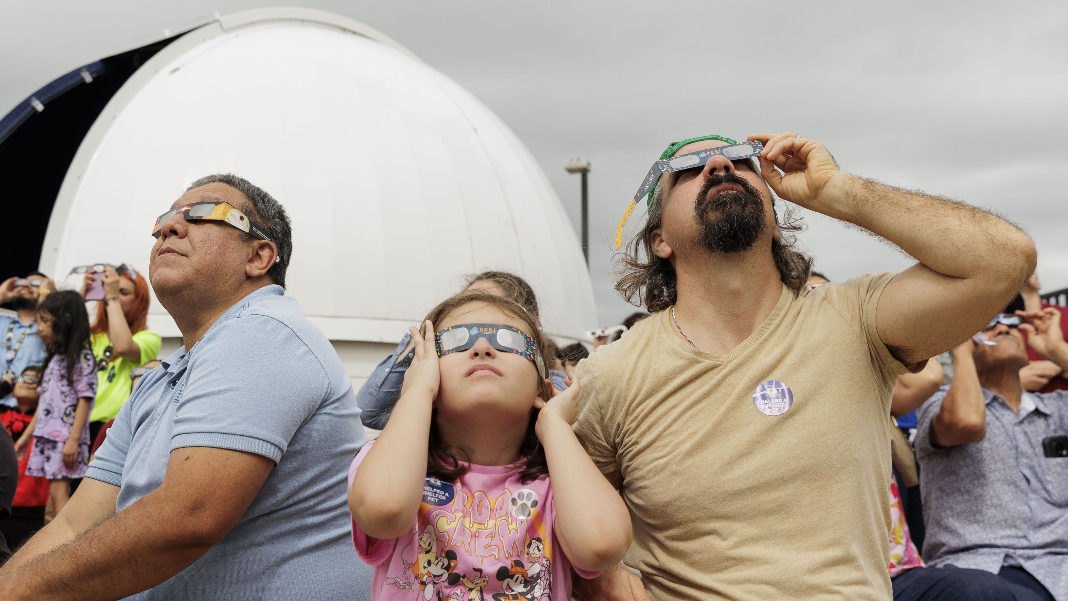 BROWNSVILLE, TEXAS - OCTOBER 14: People watch the Annular Solar Eclipse with using safety glasses in Brownsville, Texas, United States on October 14, 2023. (Photo by Mike Gonzalez/Anadolu via Getty Images)