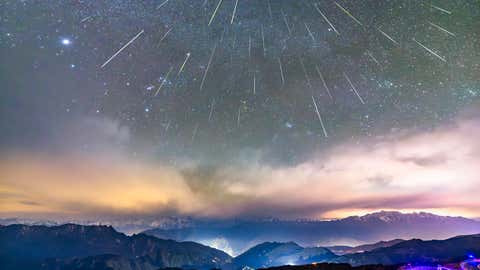 The Geminid meteor shower is witnessed at the summit of Niubei Mountain in Ya'an, Sichuan Province, China, on December 14, 2023. (Photo by Costfoto/NurPhoto via Getty Images)