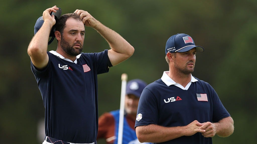 Scottie Scheffler of Team United States and teammate Bryson DeChambeau look on while playing the 11th hole during the Saturday afternoon four-balls matches of the 2025 Ryder Cup at Black Course at Bethpage State Park Golf Course on September 27, 2025 in Farmingdale, New York. (Photo by Richard Heathcote/Getty Images)