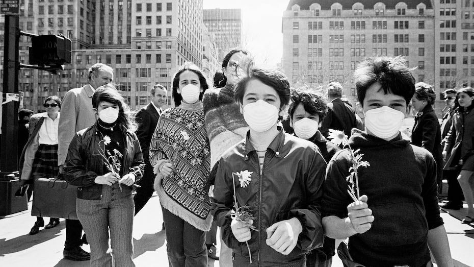 Protestors wear masks to symbolize the fight against air pollution in New York on April 20, 1970, two days before the first Earth Day