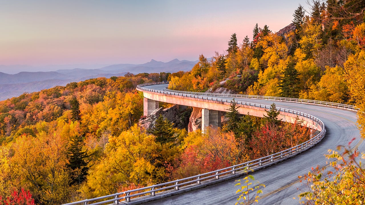 Fall foliage is seen at dawn along the Blue Ridge Parkway in North Carolina. (Pierre Leclerc Photography via Getty Images)