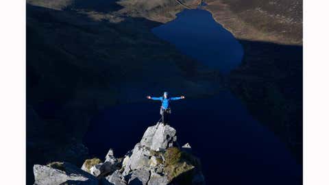 The heart-shaped Llynnau Cwm Silyn (and its nearby twin lake Cwm Dulyn) is an inviting swimming hole, with clear, blue waters perfect for a refreshing dip after a hike. (Getty Images)