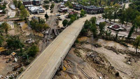 Debris is seen in the aftermath of Hurricane Helene, Monday, Sept. 30, 2024, in Asheville, N.C. (AP Photo/Mike Stewart)